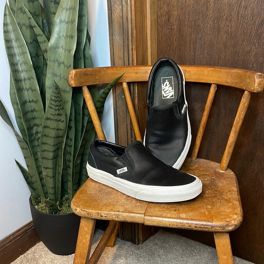 VANS black leather slip ons. 5 men 6.5 women